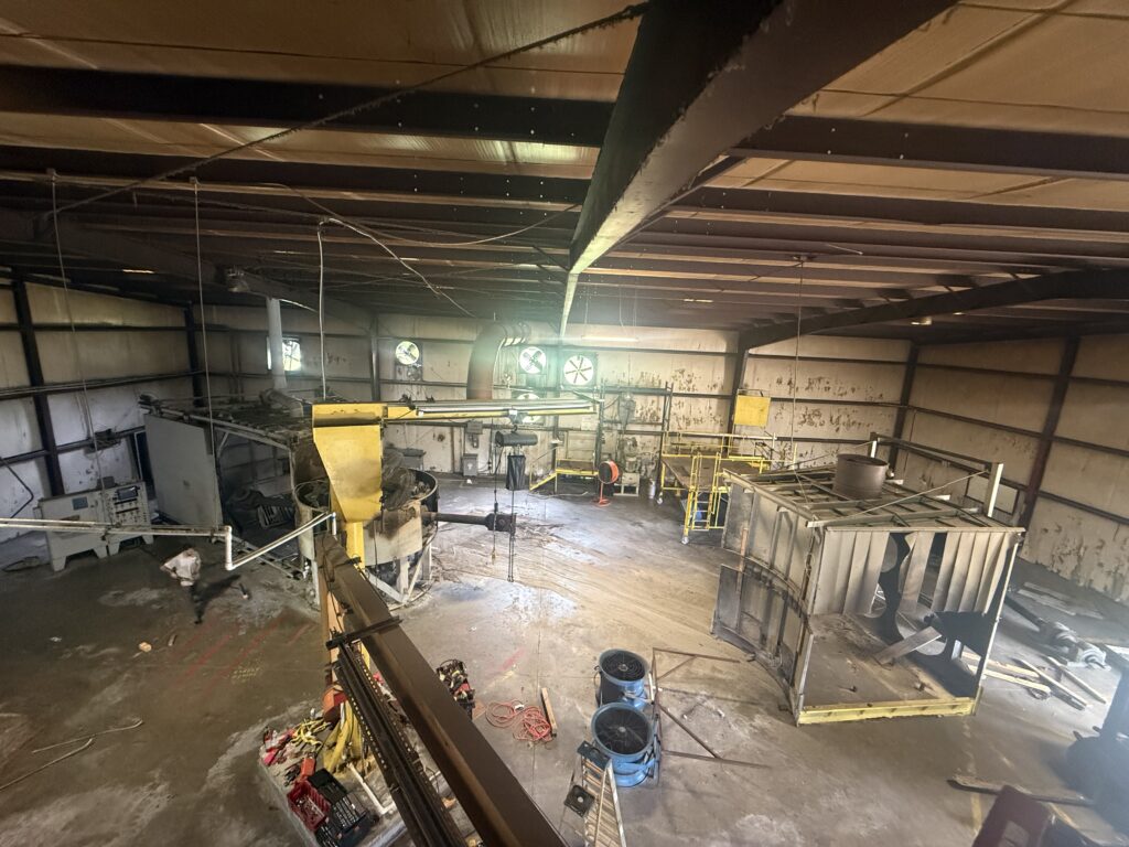 Millwright crew installing industrial machinery